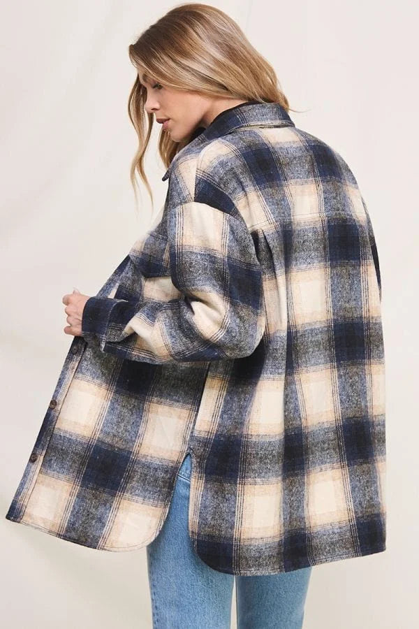 Plaid jacket styled as a women’s boho chic clothing, modeled by a person with blonde hair