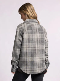 Plaid flannel shirt worn by a person with blonde hair showcasing Plaid Denim Pippin Jacket