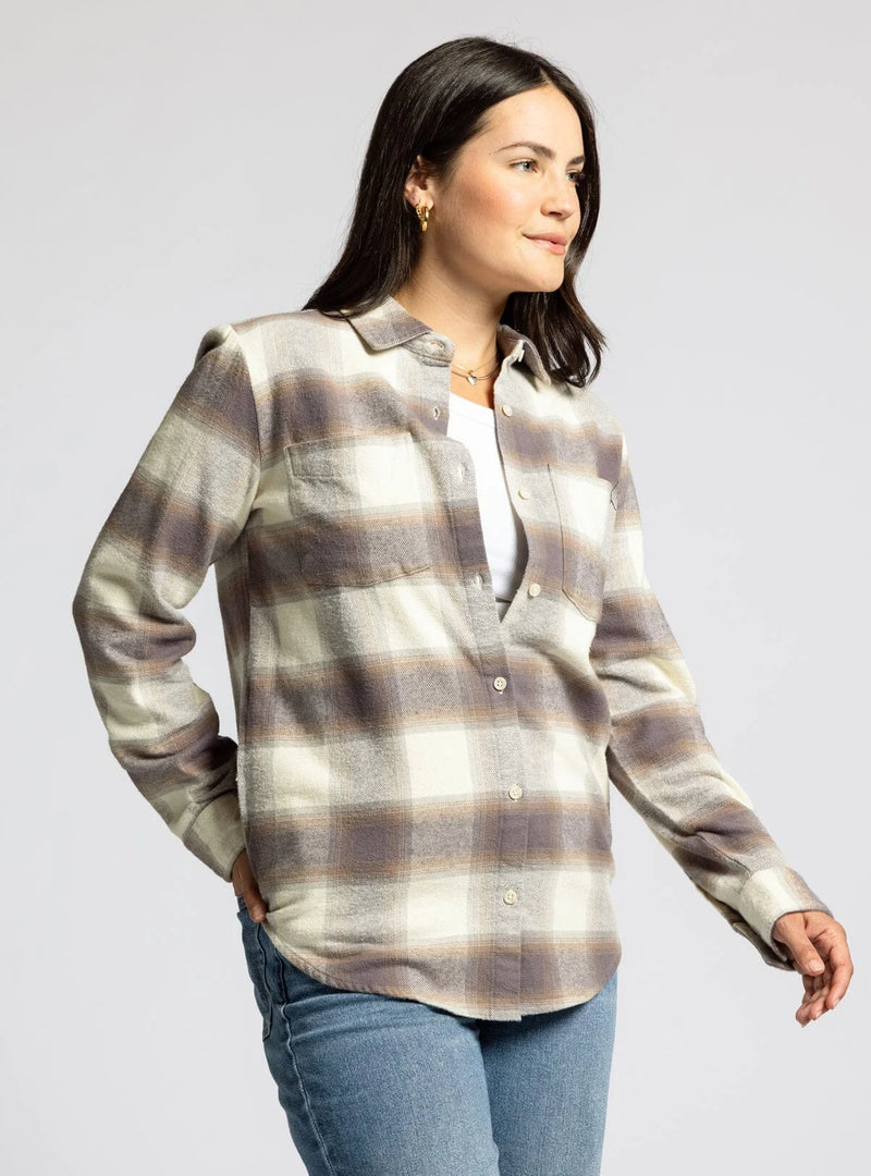 Woman wearing Everyday Flannel Button Down Shirt with collared neckline and shirt tail hem