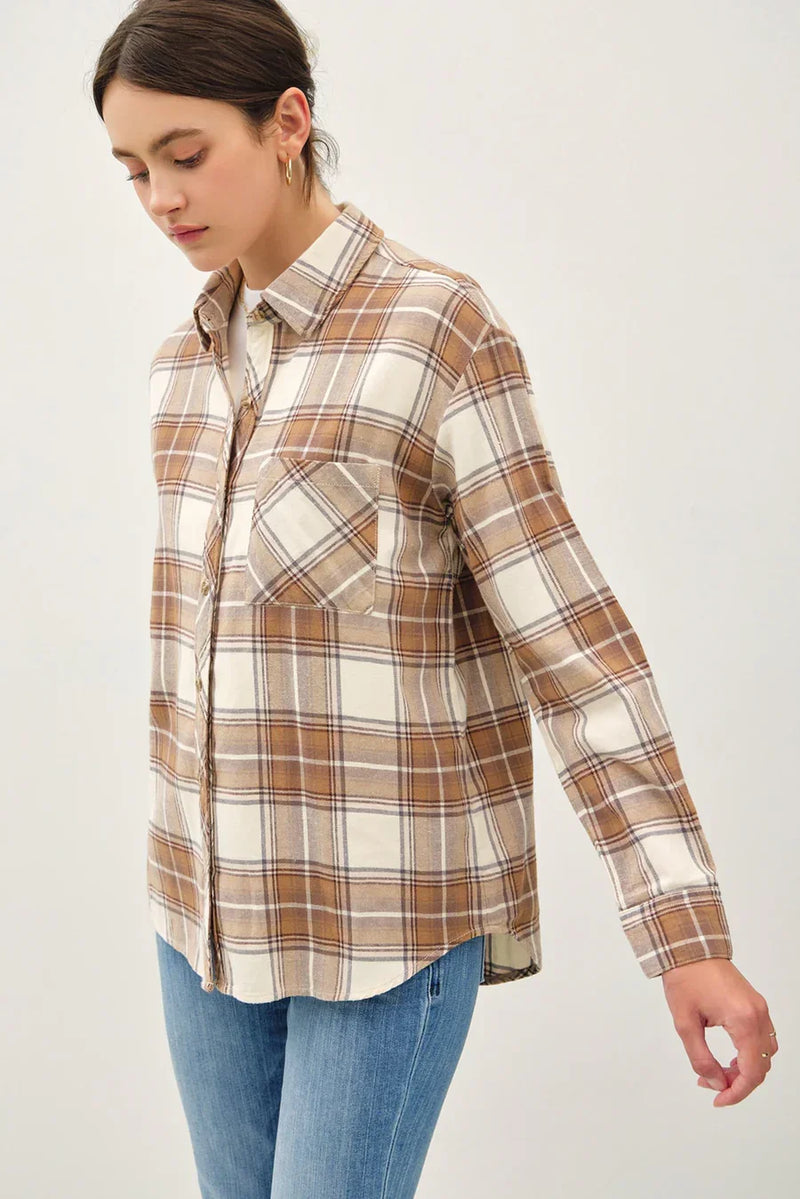 Plaid flannel shirt in earth tones, featuring a pocket oversize flannel design