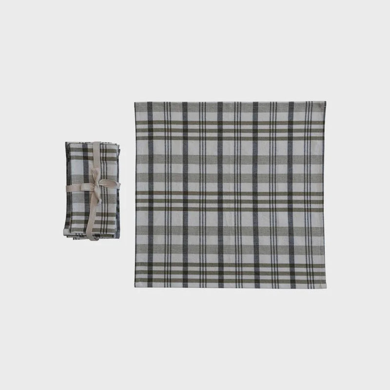 Plaid stonewashed cotton napkin and matching folded version displayed elegantly