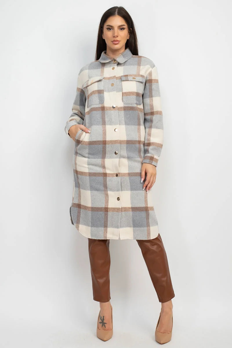 Plaid shirt dress in neutral tones with button-front closure and collar.