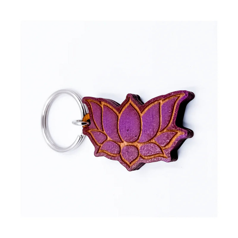 Purple leather keychain with flower design, part of the Lotus Wooden Key Chain collection