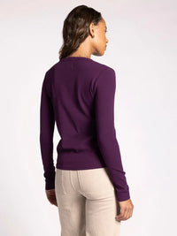 Purple long-sleeved sweater viewed from behind, featuring micro ribbed ultra soft design