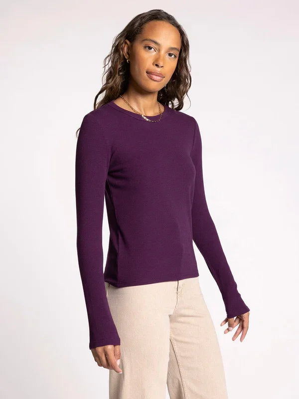 Purple long-sleeved sweater showcasing the Ribbed Ultra Soft Long Sleeve Top design