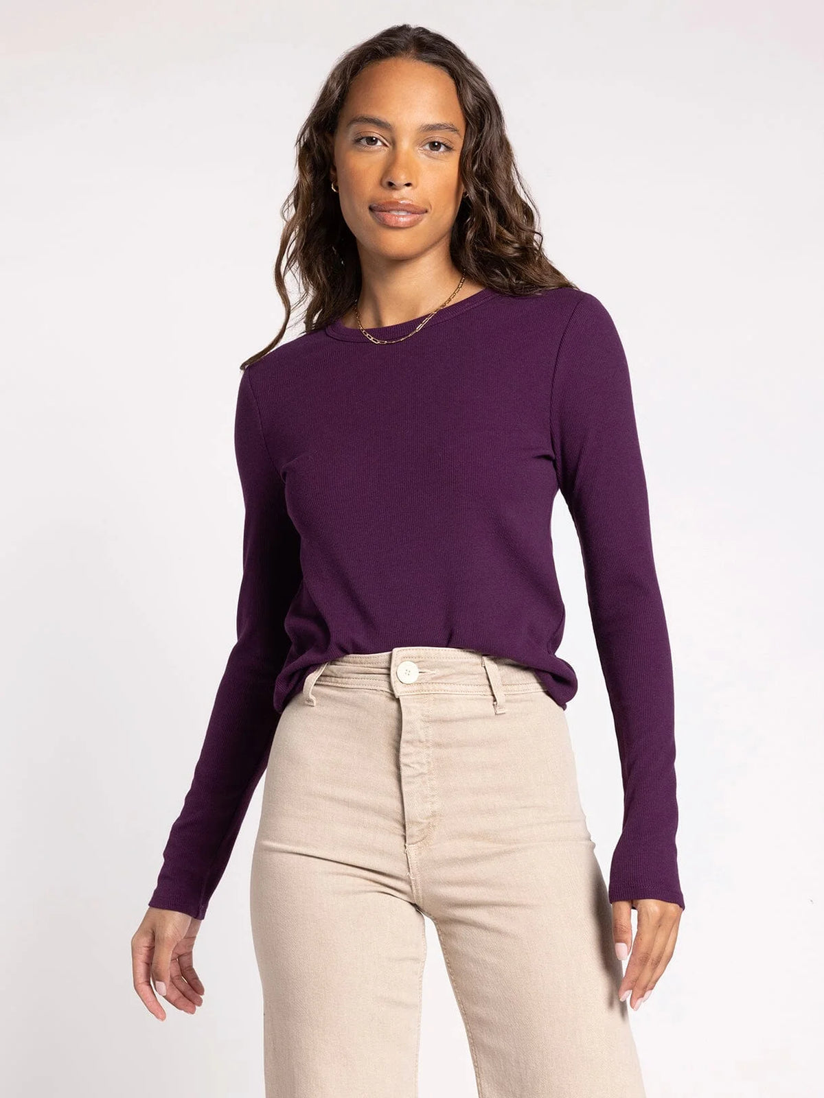 Woman wearing a purple micro ribbed ultra soft long sleeve top with khaki pants