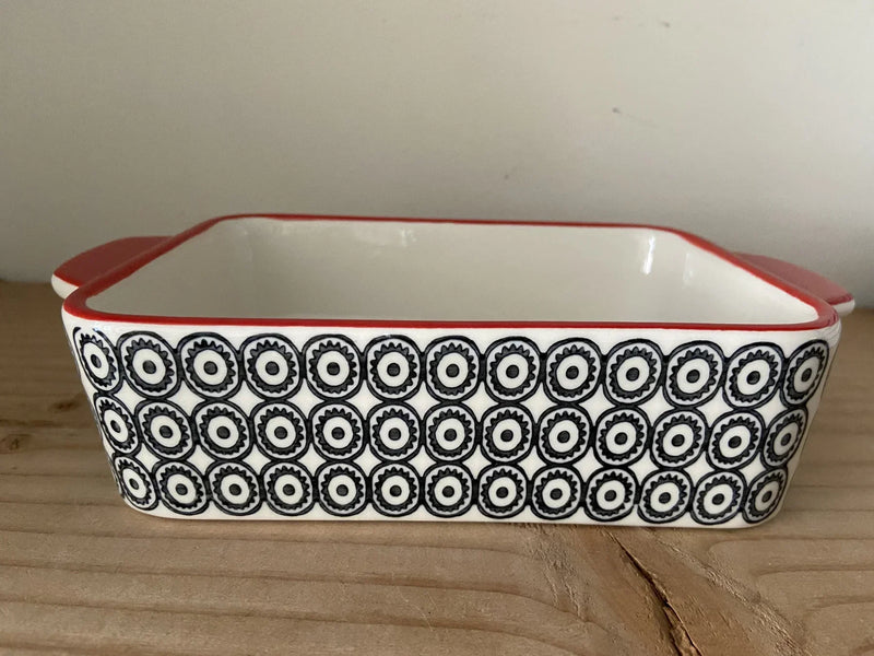 Rectangular Hand Stamped Stoneware Baker with black and white geometric pattern and red trim