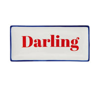Rectangular white Darling Stoneware Plate with blue trim and Darling in red text