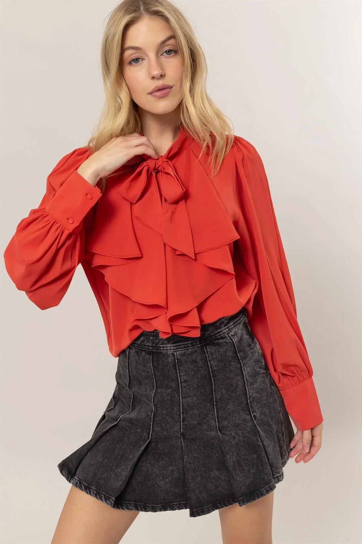 Red Tie Neck Ruffle Blouse showcasing women’s boho chic clothing from Shop Daisy