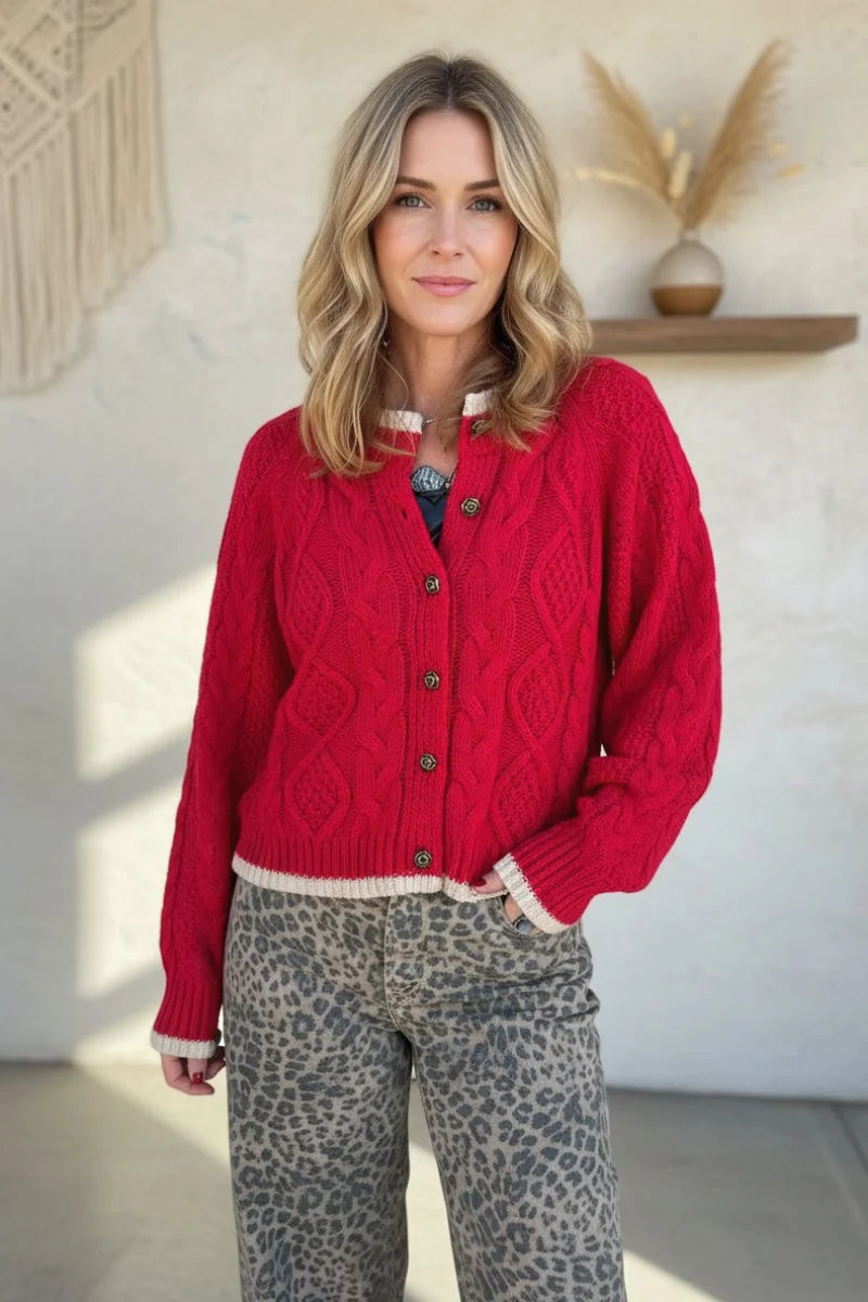 Red cable cardigan with white trim and button closure, boho chic clothing