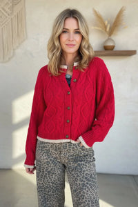 Red cable cardigan with white trim and button closure, boho chic clothing