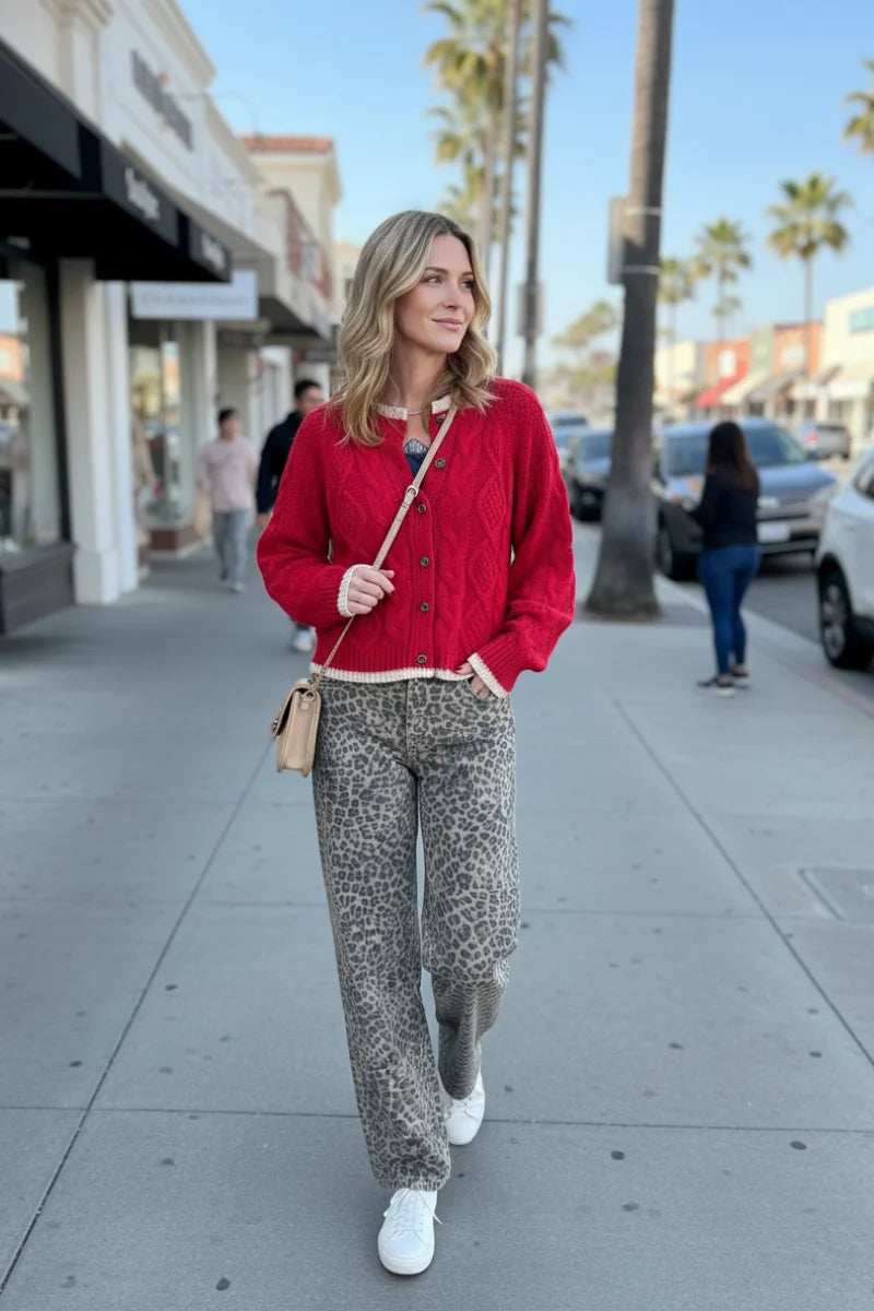 Red cable cardigan with leopard pants and white sneakers, boho chic style