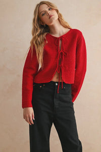 Red long sleeve cardigan with cropped sweater, drawstring hem, textured knit