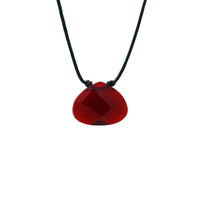 Red glass pendant on a black cord from the RED ENERGY COLOR POWER NECKLACE