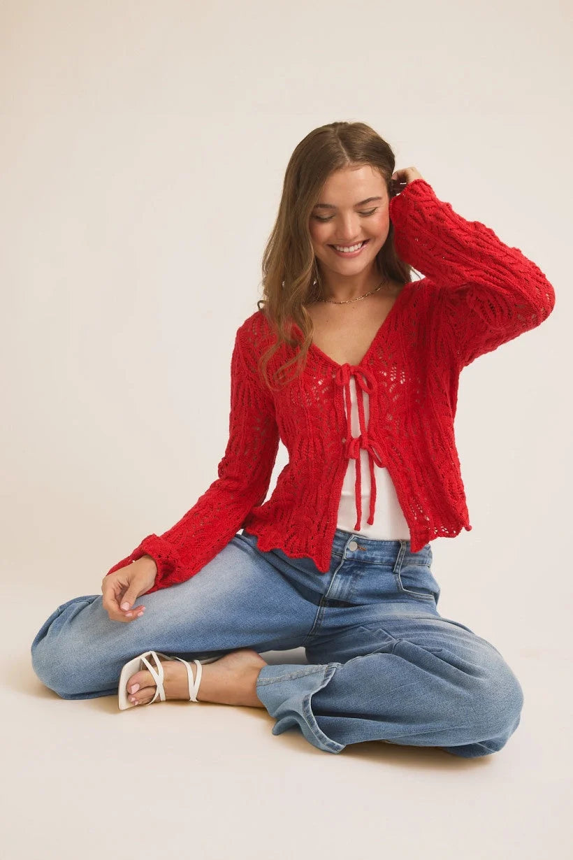 Red open knit cardigan with tie closure, perfect for women’s boho chic clothing at Shop Daisy