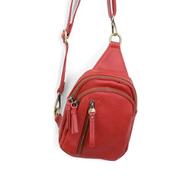 Red leather Skyler Sling Bag with convertible strap in stylish design