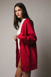 Red long sleeve oversize cardigan with buttons and pockets