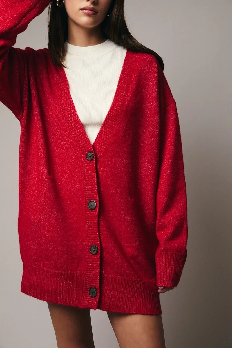 Red long sleeve oversize cardigan with button closure and ribbed cuffs