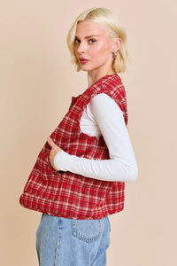 Red plaid vest jacket over a white long-sleeved shirt in ROUND NECK BOXY style