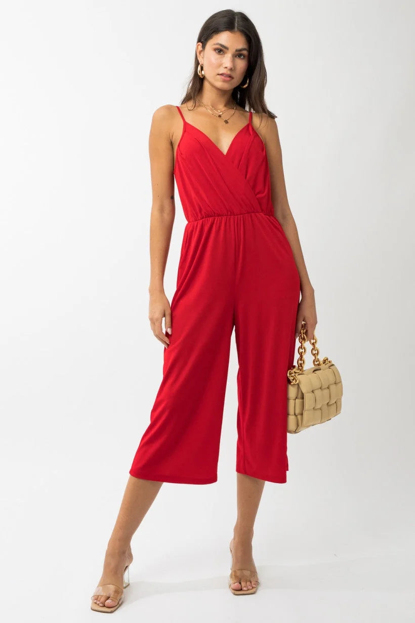 Red sleeveless cropped jumpsuit with wide-leg pants, perfect for women’s boho chic clothing