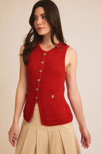 Red sleeveless sweater vest with decorative buttons from Shop Daisy for women’s boho chic clothing