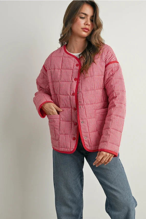Red and white checkered buttoned quilted puffer jacket with button closure