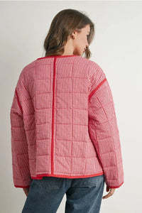 Red and white checkered buttoned quilted puffer jacket with hood