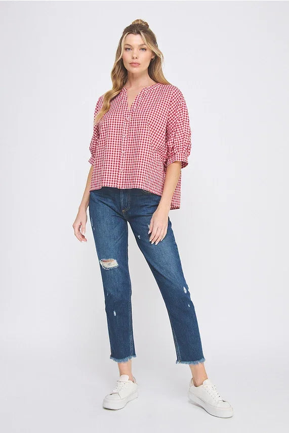 Red and white gingham dolman sleeve blouse with v-neck and three-quarter puff sleeves