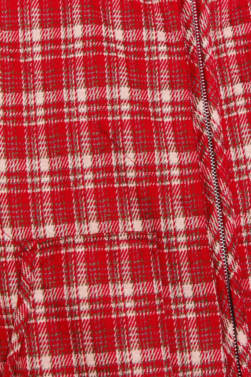 Red and white plaid fabric showcasing seam detail in a stylish vest jacket by Shop Daisy