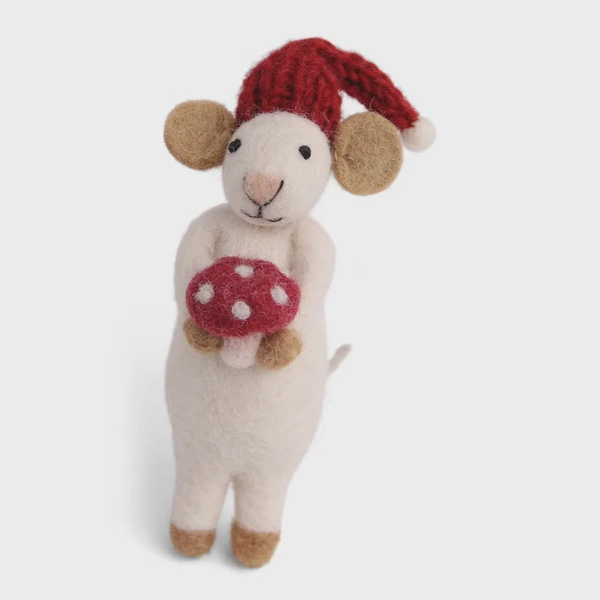Handmade mouse ornament holding a red and white polka dot mushroom with Santa hat