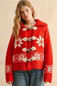 Red and white snow flake pattern sweater jacket with hood and toggles