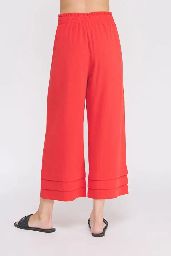 Red wide-leg elastic ruffle waist ankle pants displayed in ELASTIC RUFFLE WAIST ANKLE PANTS product image