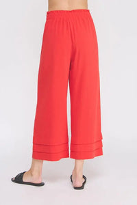 Red wide-leg elastic ruffle waist ankle pants displayed in ELASTIC RUFFLE WAIST ANKLE PANTS product image