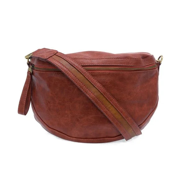 Reddish-brown vegan leather Laura Contrast Strap Sling Belt Bag with adjustable strap