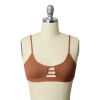 Ribbed brown horizontal strap bralette featuring stylish cutouts for a modern look