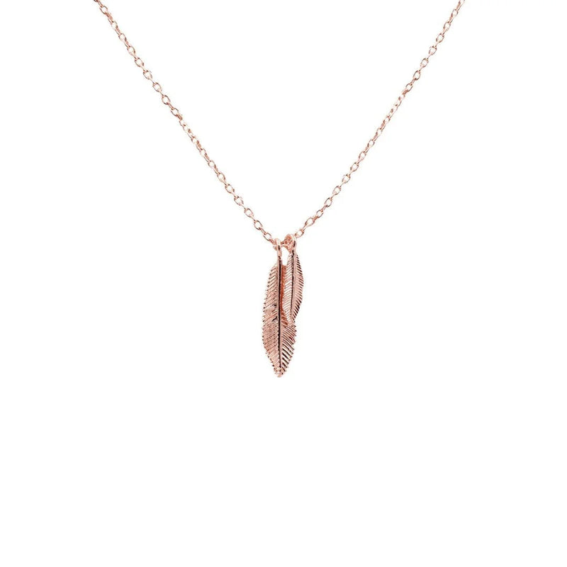 Elegant rose gold feather pendant necklace designed for bohemian girls