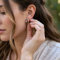 Festive candy cane sparkle clip-on earrings in rose gold and green gems