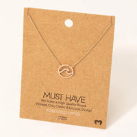Rose gold wave pendant necklace featuring a stylish wave design and cutout detail