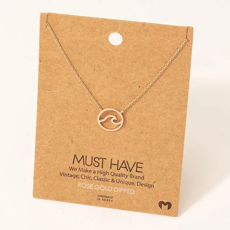 Rose gold wave pendant necklace featuring a stylish wave design and cutout detail