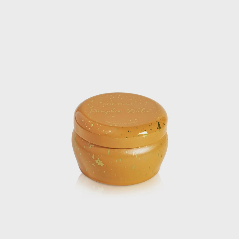 Round orange-brown Pumpkin Dulce Glimmer mini tin candle with glitter and lid