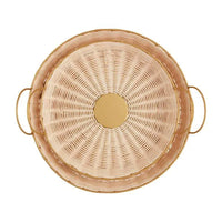 Round woven brass tray with gold handles, ideal for women’s boho chic clothing displays