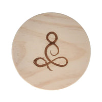 Round wooden disc with abstract design on Neroli Candle featuring a zesty fragrance and wooden lid
