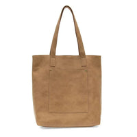 Charlie’s North/South Tote in tan features vegan leather and an interior zip closure