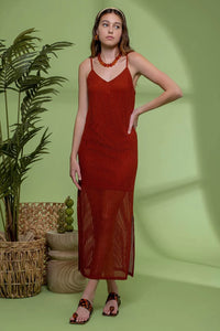 Rust-colored knit midi dress with spaghetti straps and V-neckline featuring split hem