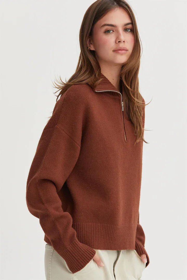 Rust-colored drop shoulder half zip sweater with collar and partial zipper