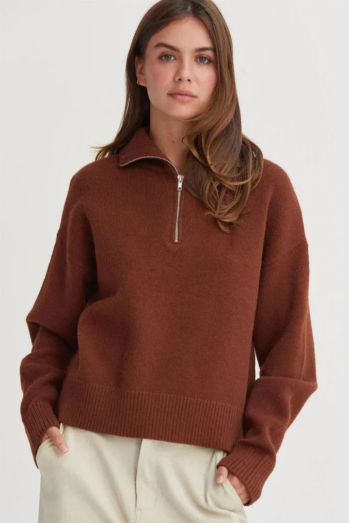 Rust-colored drop shoulder half zip sweater featuring a stylish quarter-zip collar