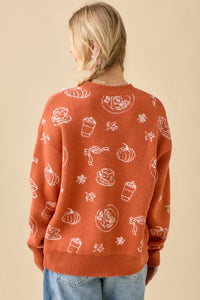 Rust-colored Pumpkin Spice Printed Sweater with fall-themed pumpkins, leaves, and coffee cups