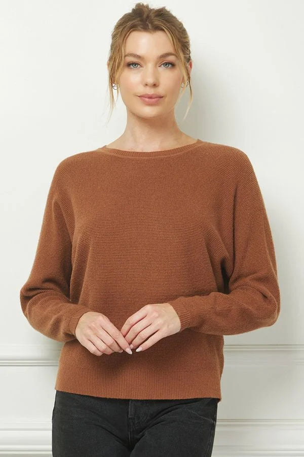 Rust-colored fine gauge mini waffle texture sweater with crew neck and long sleeves