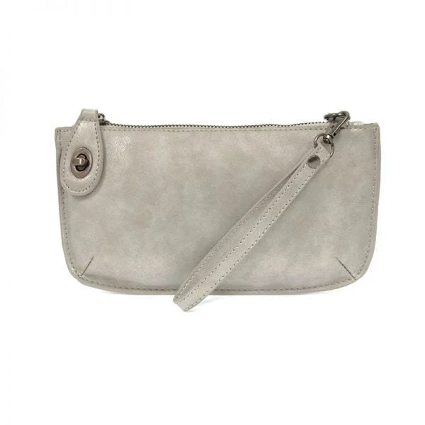 Saa Leather Crossbody Bag showcased in Lux Crossbody Wristlet Clutch for stylish convenience