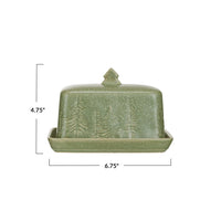 Sage green stoneware butter dish with embossed pine tree design